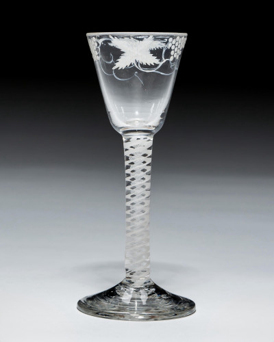 A BEILBY ENAMELLED WITH FRUITING VINE
