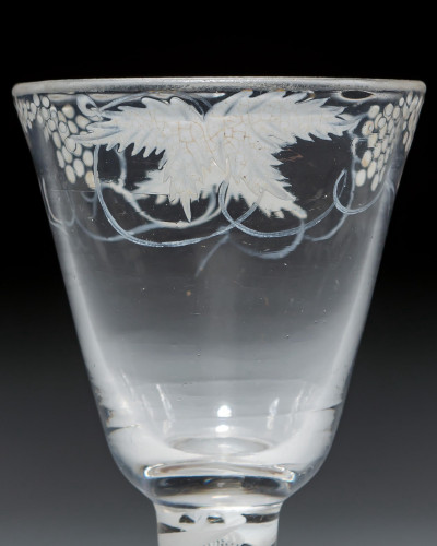 A BEILBY ENAMELLED WITH FRUITING VINE