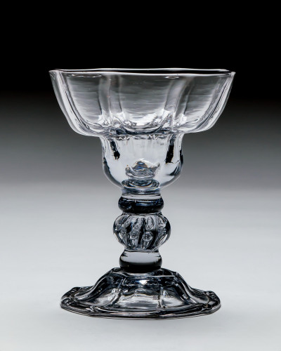 A PANEL-MOULDED SWEETMEAT WITH CENTRAL BEADED KNOP