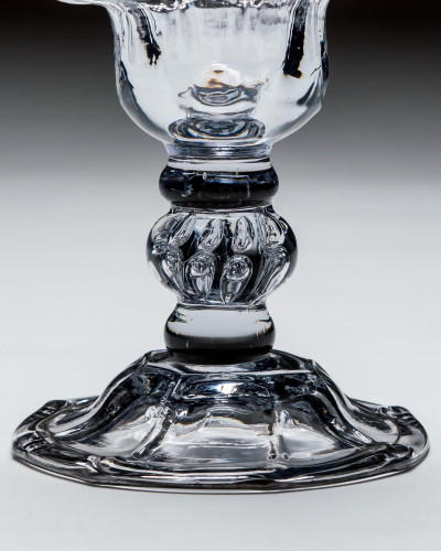 A PANEL-MOULDED SWEETMEAT WITH CENTRAL BEADED KNOP