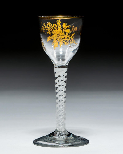 A FINELY DECORATED FLORAL GILES WINE GLASS