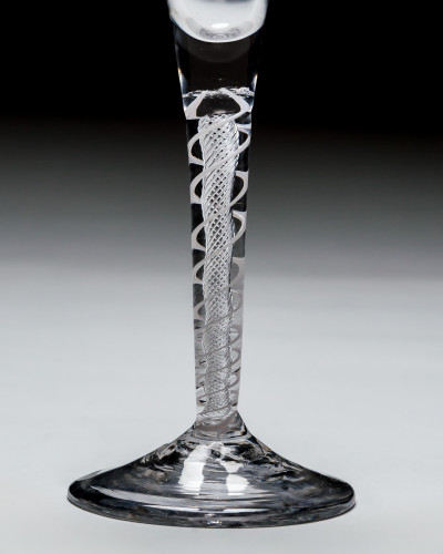 AN UNUSUAL PAIR OF MIXED TWIST WINE GLASSES