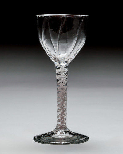 A GENEROUS PANEL MOULDED OPAQUE TWIST WINE GLASS