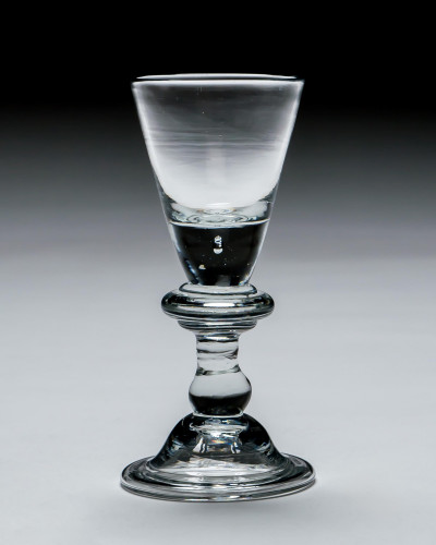 A SMALL ANNULATED KNOP BALUSTER WINE GLASS