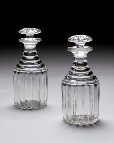 A PAIR OF WILLIAM IV PILLAR CUT DECANTERS