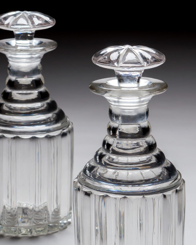 A PAIR OF WILLIAM IV PILLAR CUT DECANTERS
