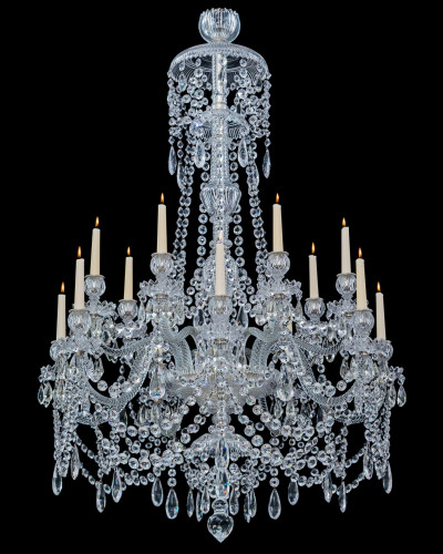A FOURTEEN LIGHT ANTIQUE CRYSTAL CHANDELIER BY PERRY & CO