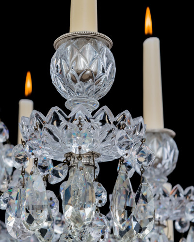A FOURTEEN LIGHT ANTIQUE CRYSTAL CHANDELIER BY PERRY & CO