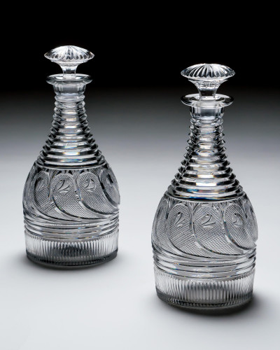A PAIR OF REGENCY CUT GLASS DECANTERS