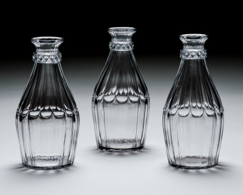 AN ELEGANT SET OF THREE 18TH CENTURY CARAFES