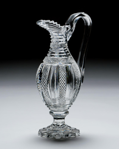 A FINE REGENCY PEDESTAL BASE EWER