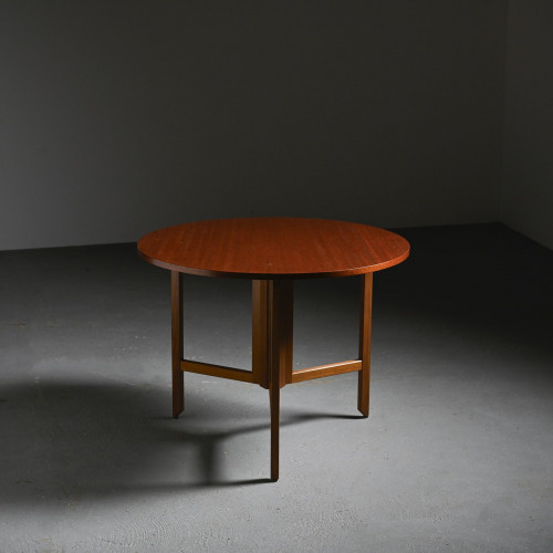 Round mahogany table by André Sornay, Meubles Sornay 1960