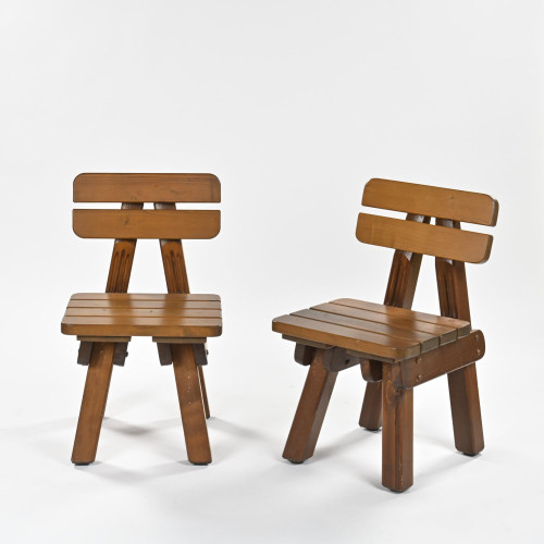 Pair of solid pine lounge chairs, brutalist work, circa 1970