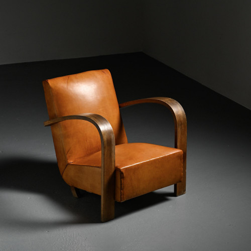 Fauteuil club Art Deco en cuir havane, vers 1940