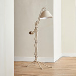 A painted wrought iron floor lamp attributed to René Prou (1887 - 1947)