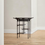 An Aesthetic Movement ebonised rectangular side table attributed to F.B. Goodyer for The Aesthetic Gallery