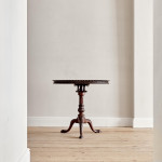 An exceptional George II mahogany tilt top tea table