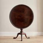 An exceptional George II mahogany tilt top tea table