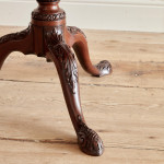 An exceptional George II mahogany tilt top tea table