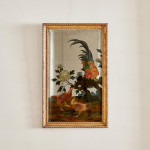 A Chinese Export reverse painted mirror