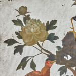A Chinese Export reverse painted mirror