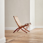 An early JH512 oak and rattan folding chair by Hans Wegner (1914 - 2007)