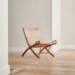 An early JH512 oak and rattan folding chair by Hans Wegner (1914 - 2007)