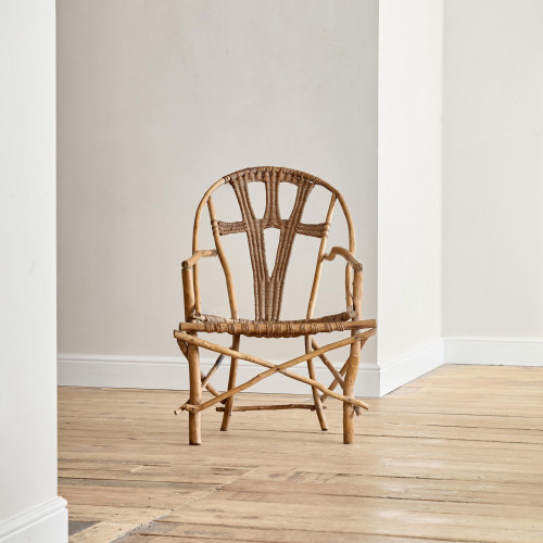 An unusual willow and wicker armchair
