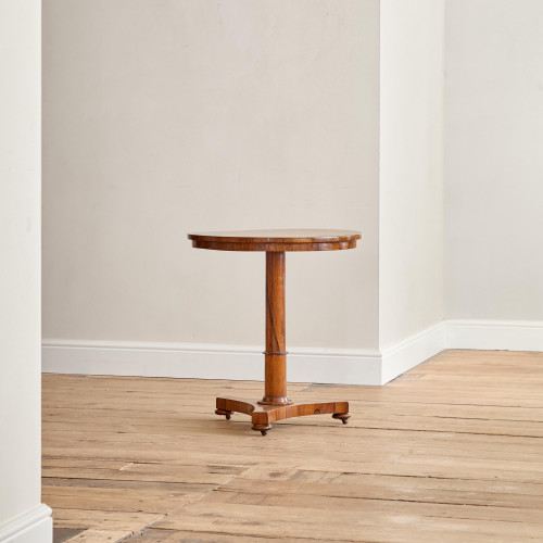 A Regency rosewood circular tilt top occasional table