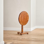 A Regency rosewood circular tilt top occasional table