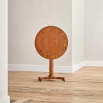 A Regency rosewood circular tilt top occasional table