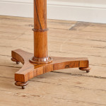 A Regency rosewood circular tilt top occasional table