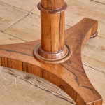 A Regency rosewood circular tilt top occasional table