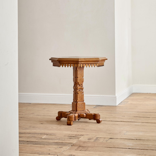 A Victorian oak Gothic Revival octagonal occasional table