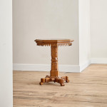 A Victorian oak Gothic Revival octagonal occasional table