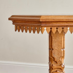 A Victorian oak Gothic Revival octagonal occasional table