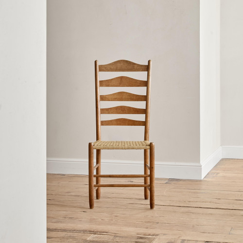 An ash ladderback chair designed by Ernest Gimson (1864 - 1919) and made by Edward Gardiner (1903 - 1958)
