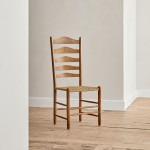 An ash ladderback chair designed by Ernest Gimson (1864 - 1919) and made by Edward Gardiner (1903 - 1958)