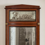 An Empire mahogany and satinwood pier mirror