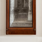 An Empire mahogany and satinwood pier mirror