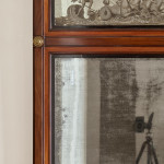 An Empire mahogany and satinwood pier mirror