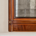 An Empire mahogany and satinwood pier mirror