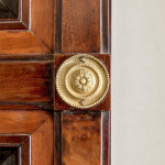 An Empire mahogany and satinwood pier mirror