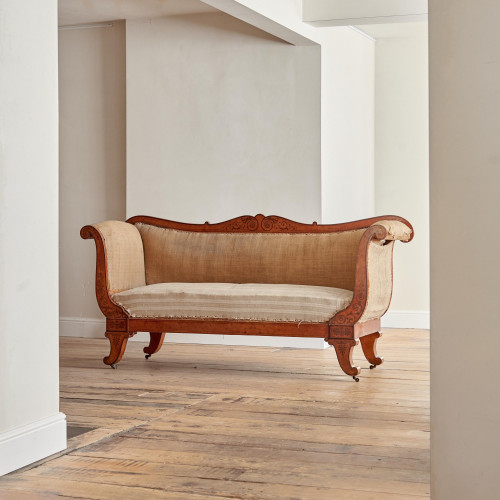 A fine Regency Amboyna sofa in the manner of George Bullock (1777 - 1818)