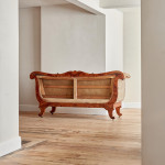 A fine Regency Amboyna sofa in the manner of George Bullock (1777 - 1818)