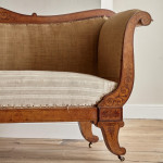 A fine Regency Amboyna sofa in the manner of George Bullock (1777 - 1818)