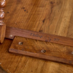 A Victorian walnut folding bobbin table