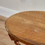 A Victorian walnut folding bobbin table