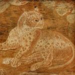 A large 19th century woolwork picture of a leopard