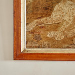 A large 19th century woolwork picture of a leopard